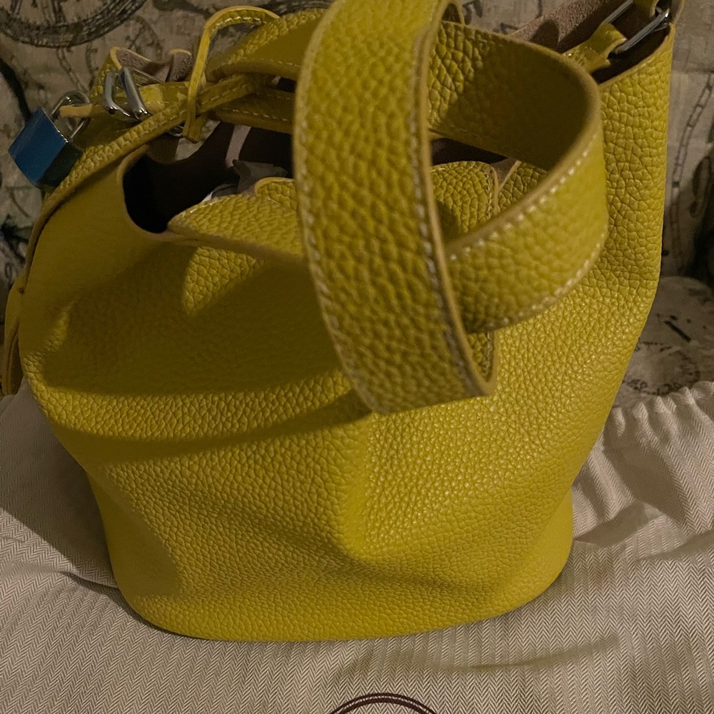 Brand New,  Lime Green Leather and Suede bucket bag with lock , key & dustbag.